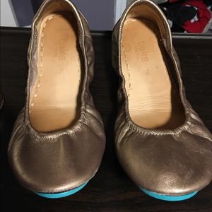 Bronze Tieks and shoe cream